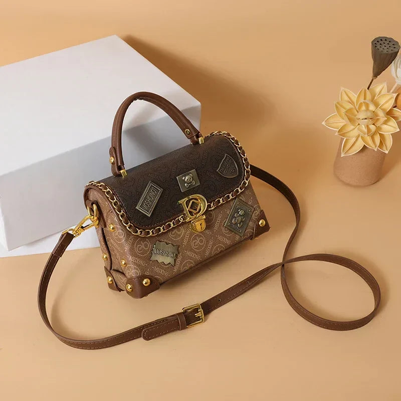 Mazur & Mazur© – Retro torba na ramię z monogramem i złotymi detalami Zelda™