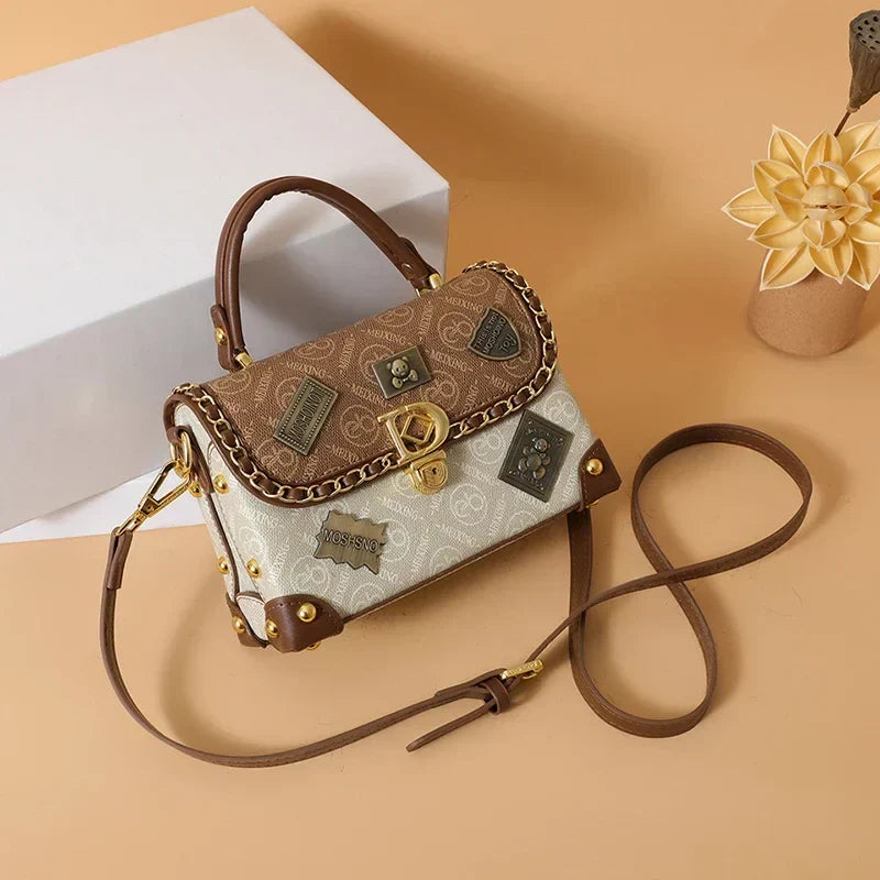 Mazur & Mazur© – Retro torba na ramię z monogramem i złotymi detalami Zelda™