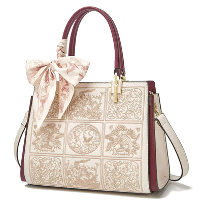 Sylvia™ – Unikalna torebka crossbody z haftem i kokardą od Mazur & Mazur©